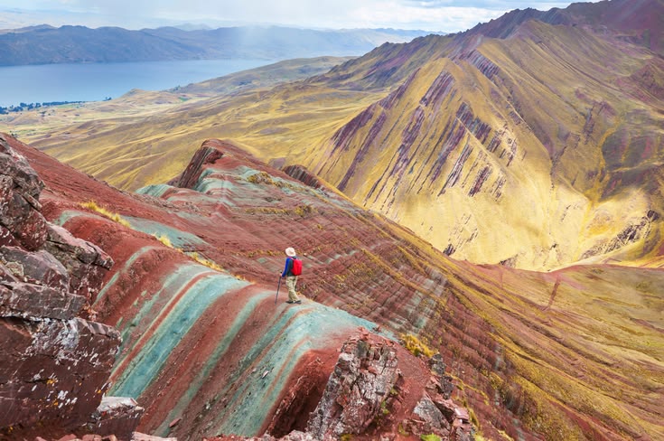 Palcoyo Rainbow Mountain in Peru with colorful mountains and Stone Forest